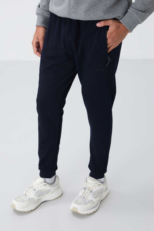 Pantaloni de trening pentru bărbați, bleumarin, cu fermoar și croială standard, Tommylife Wholesale - 84651