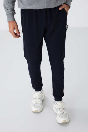 Pantaloni de trening pentru bărbați, bleumarin, cu fermoar și croială standard, Tommylife Wholesale - 84651