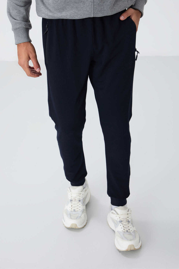 Pantaloni de trening pentru bărbați, bleumarin, cu fermoar și croială standard, Tommylife Wholesale - 84651