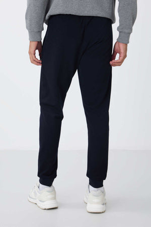 Pantaloni de trening pentru bărbați, bleumarin, cu fermoar și croială standard, Tommylife Wholesale - 84651